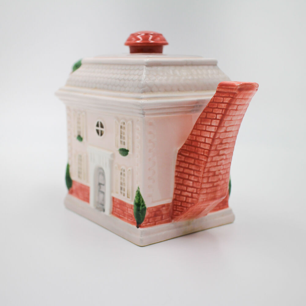 Fitz and Floyd teapot, sugar bowl and milk jar set