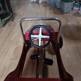 Vintage red pedal car