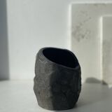 Asymmetrical sculpted concrete vase