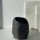 Asymmetrical sculpted concrete vase