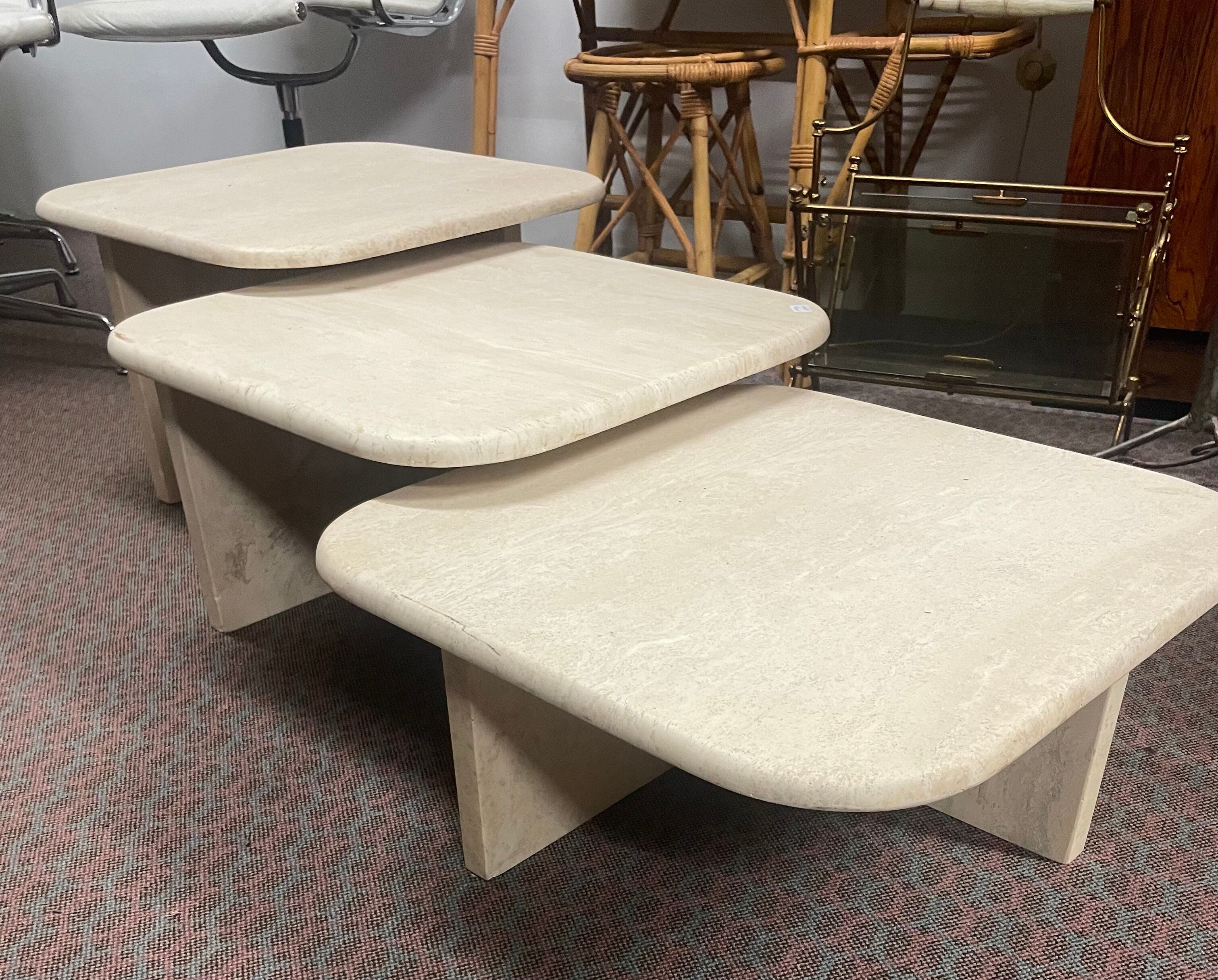 Modular pull-out coffee tables in travertine