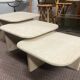 Modular pull-out coffee tables in travertine