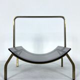 Fontana Arte, Mid-Century brass and curved glass magazine holder. Italy 1960s