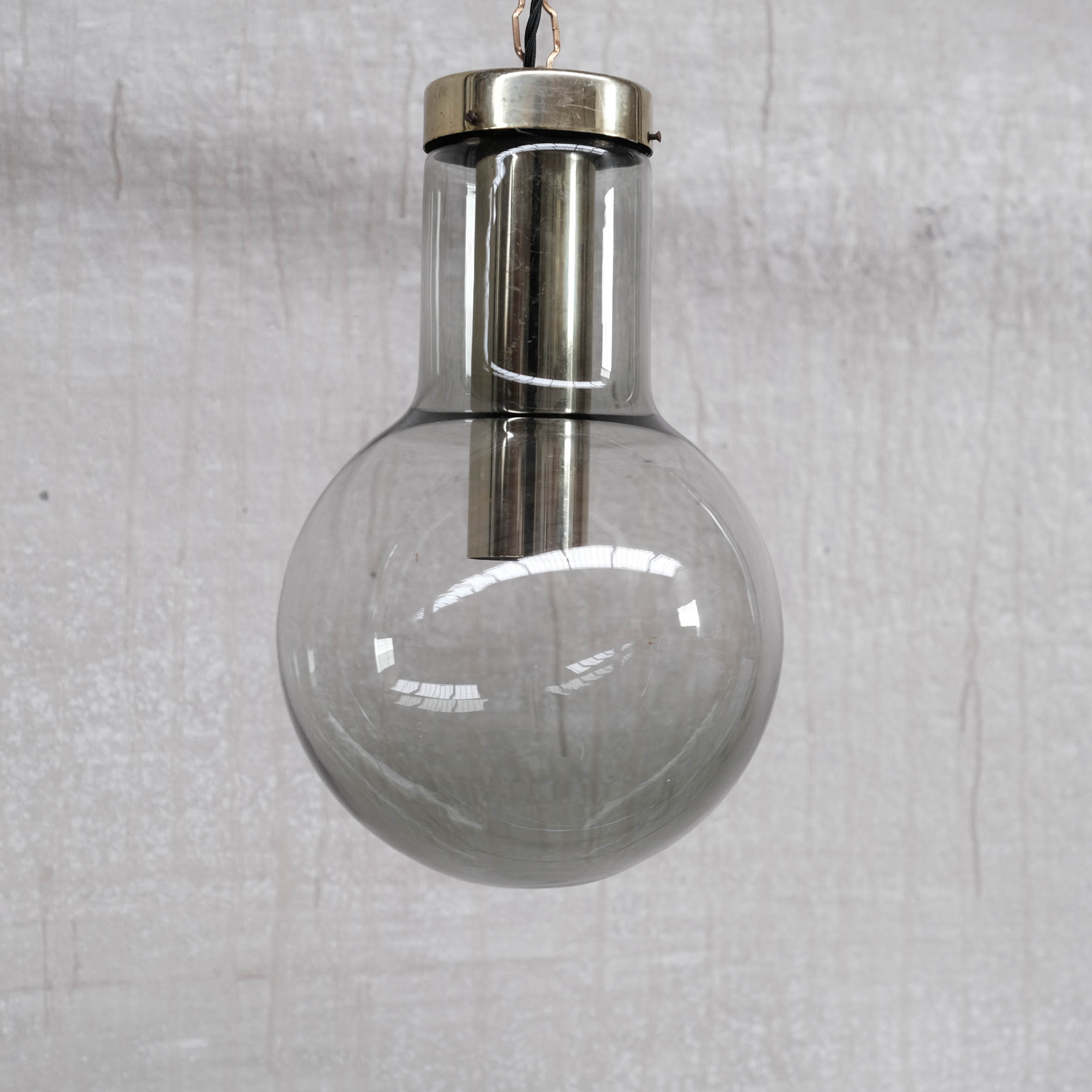 Smoked mid-century glass and brass pendant light by raak