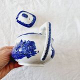 Small porcelain teapot or milk jug with the famous blue willow or weeping pattern