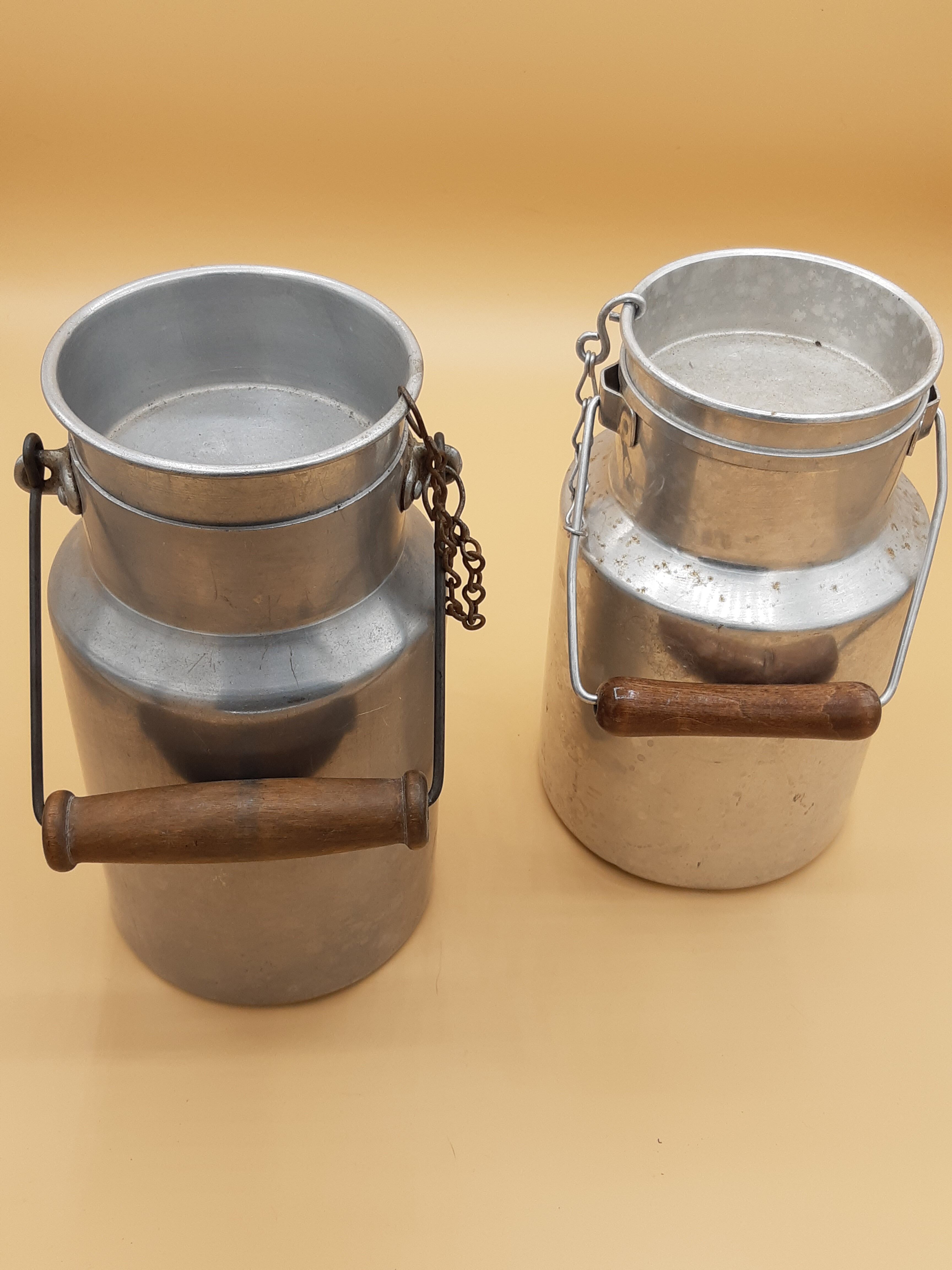 Old aluminum milk jars, wooden handle, lot of 2