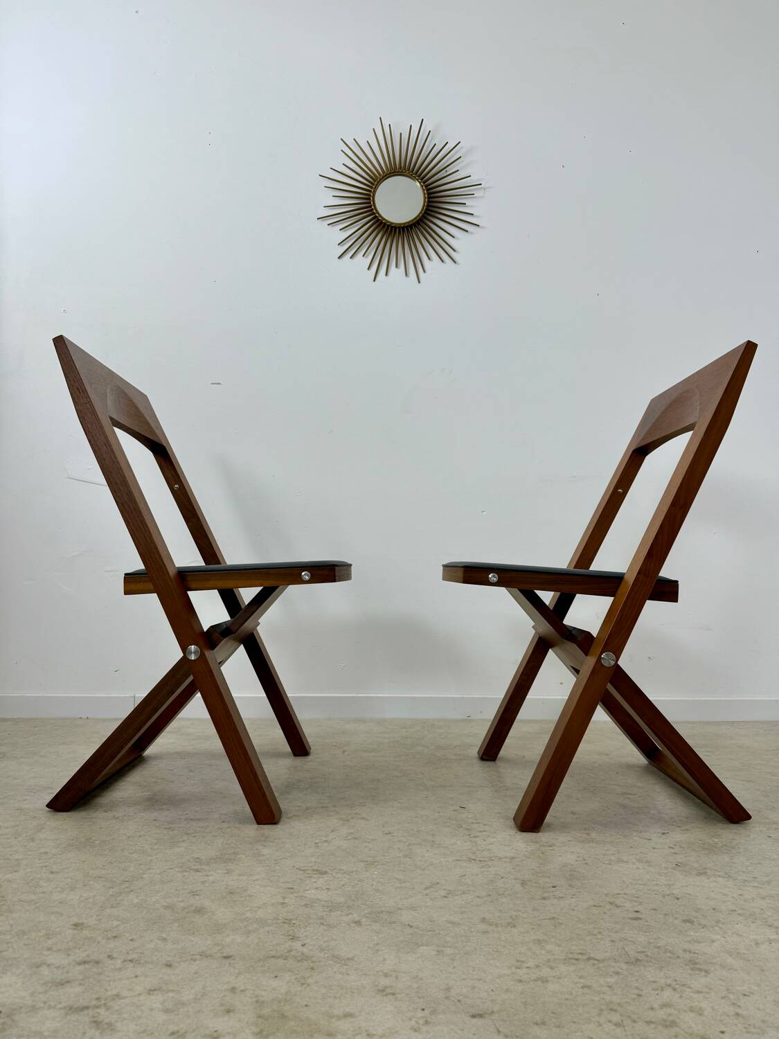 2 old folding chairs in wood and leather, postmodern design from the 80s vintage