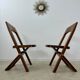 2 old folding chairs in wood and leather, postmodern design from the 80s vintage