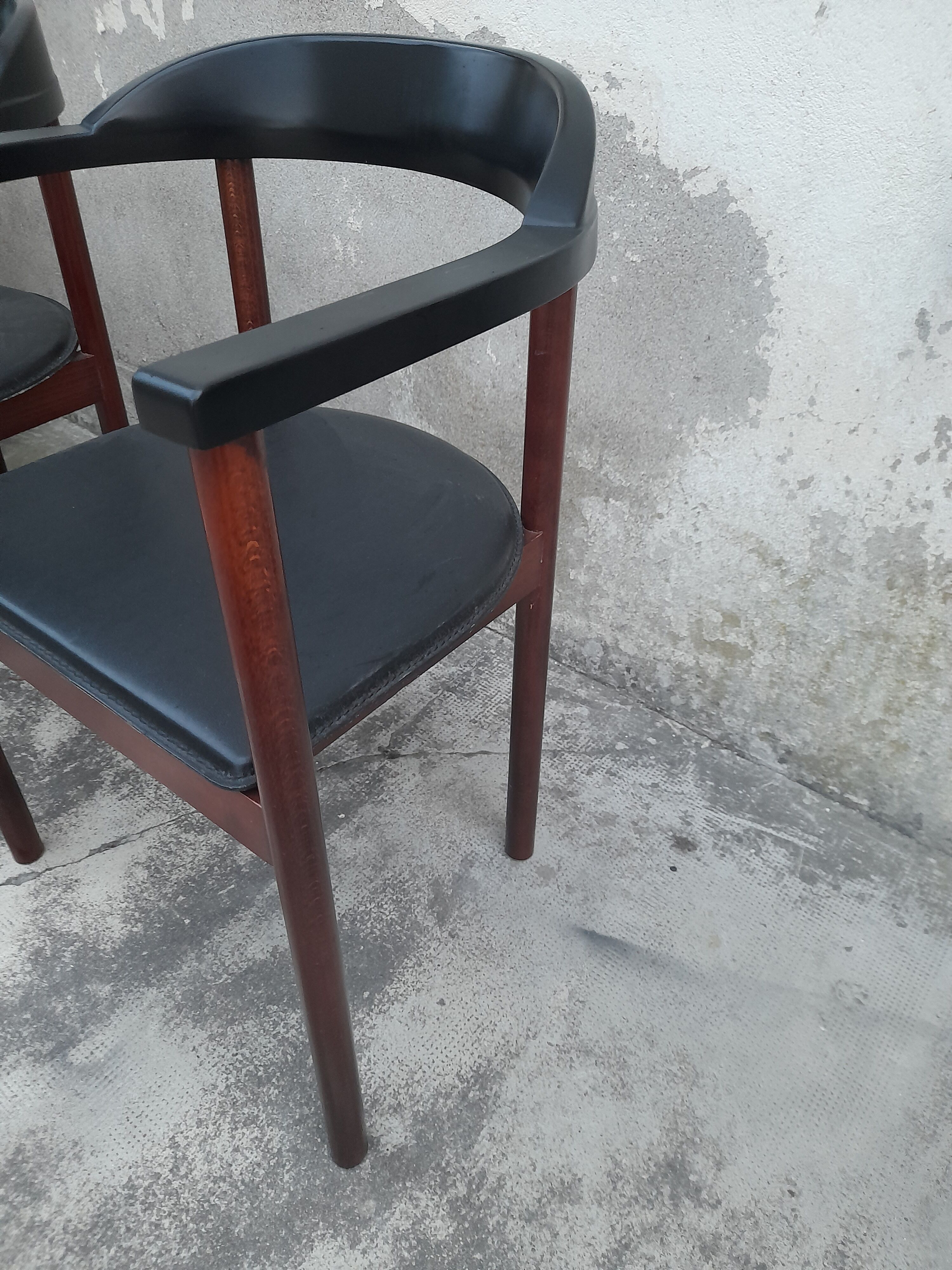 Pair of Scandinavian armchairs in teak and leather