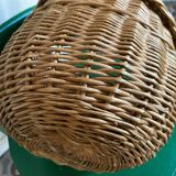 Round wicker basket in a bohemian style.