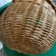 Round wicker basket in a bohemian style.