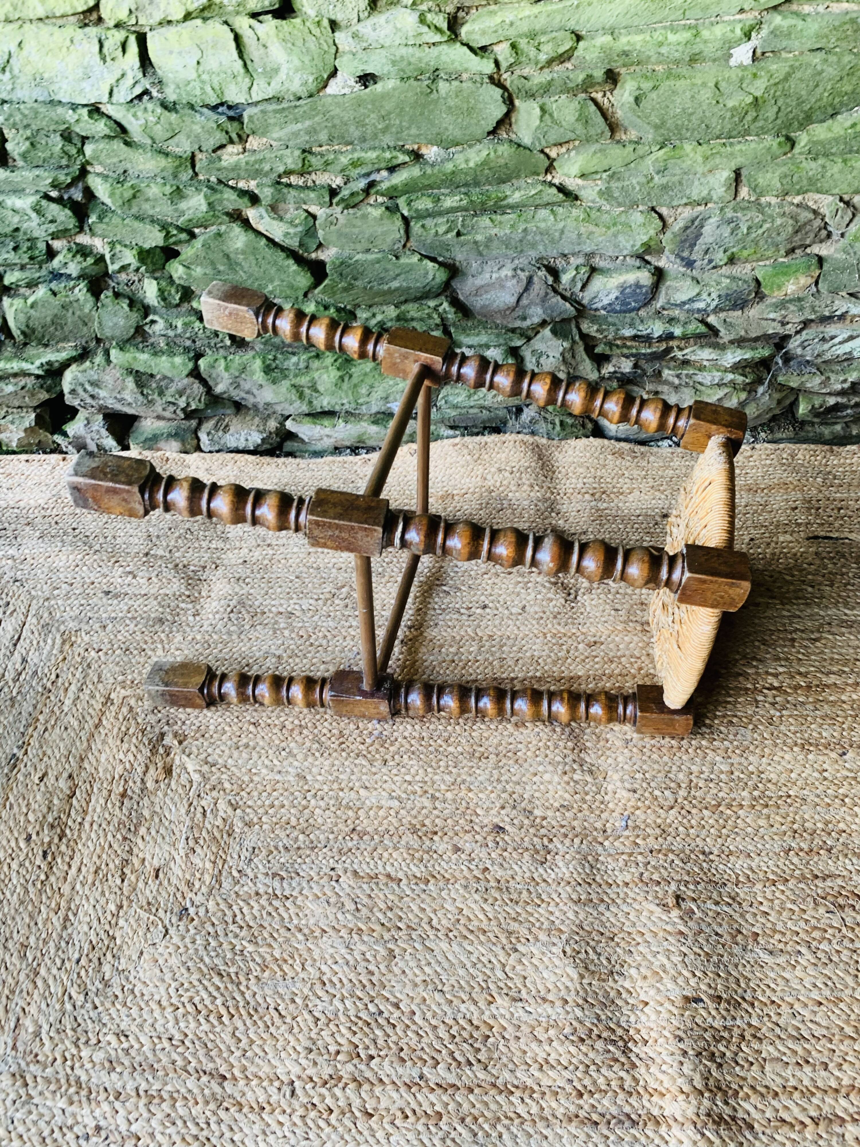 High stool in turned wood