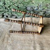 High stool in turned wood