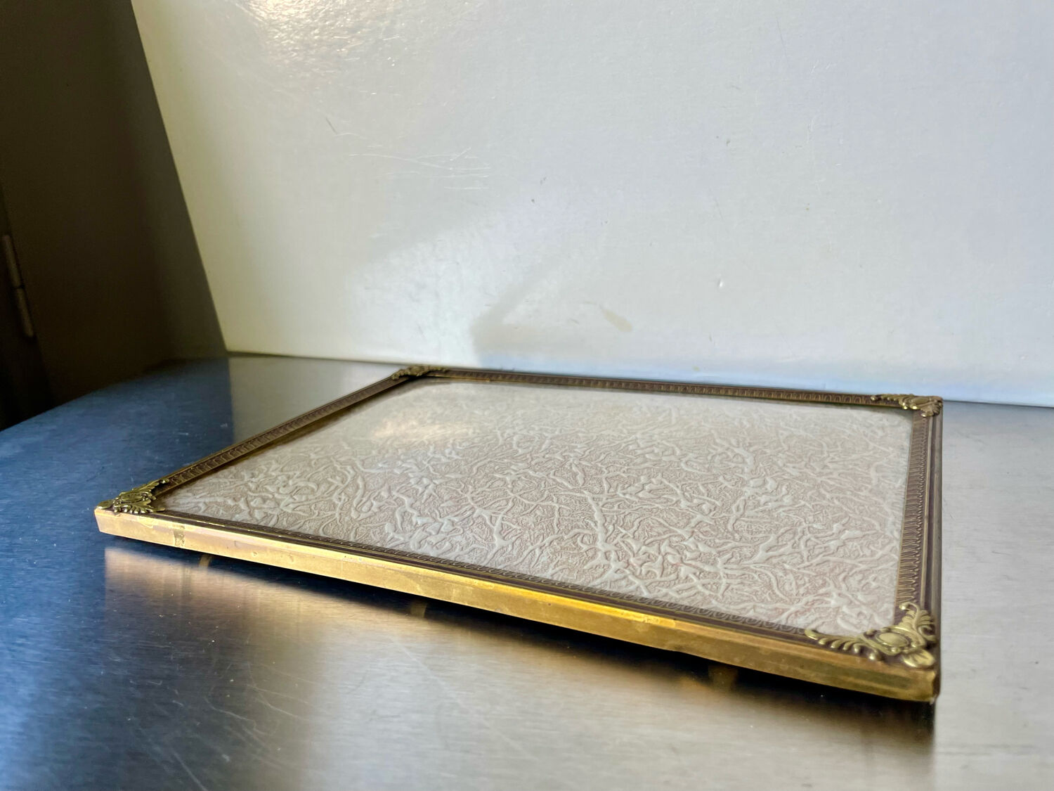 Metal vintage frame in gold colored brass