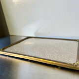 Metal vintage frame in gold colored brass