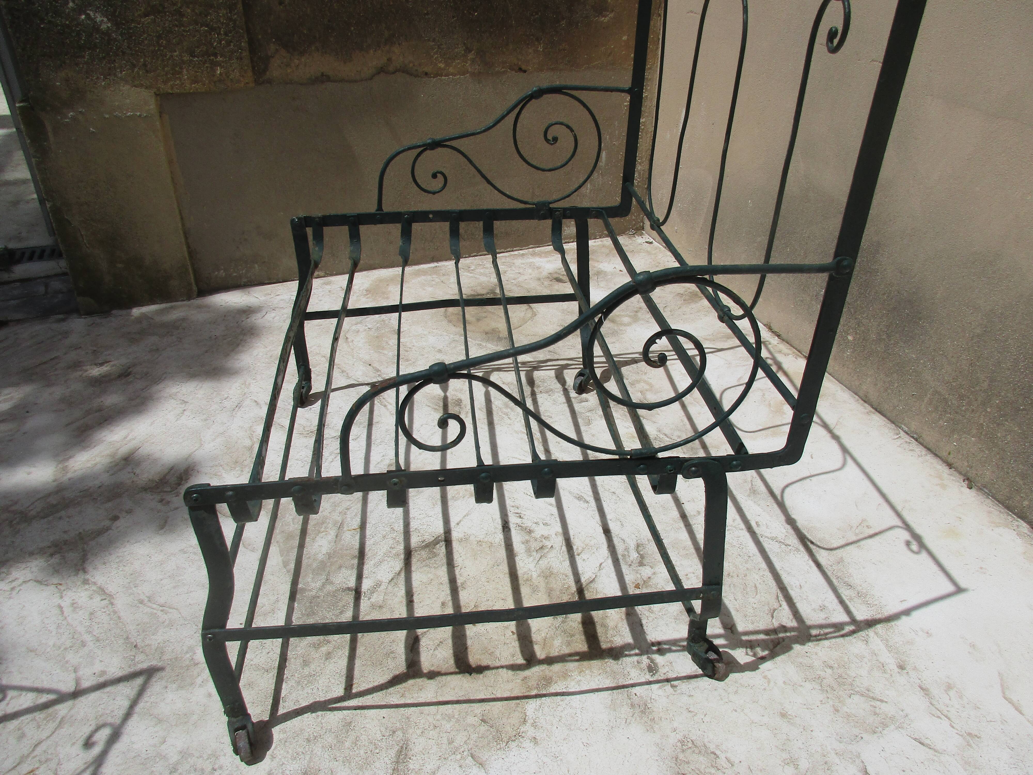 Pair of iron garden chairs forge
