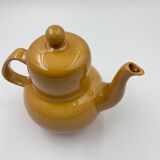 Yellow ceramic teapot