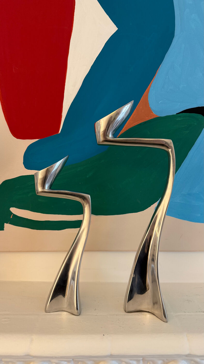 Set of 2 Swann candle holders by Matthew Hilton