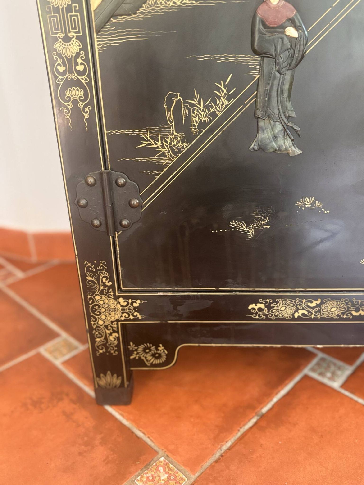 Magnificent black and gold lacquered Chinese cabinet.