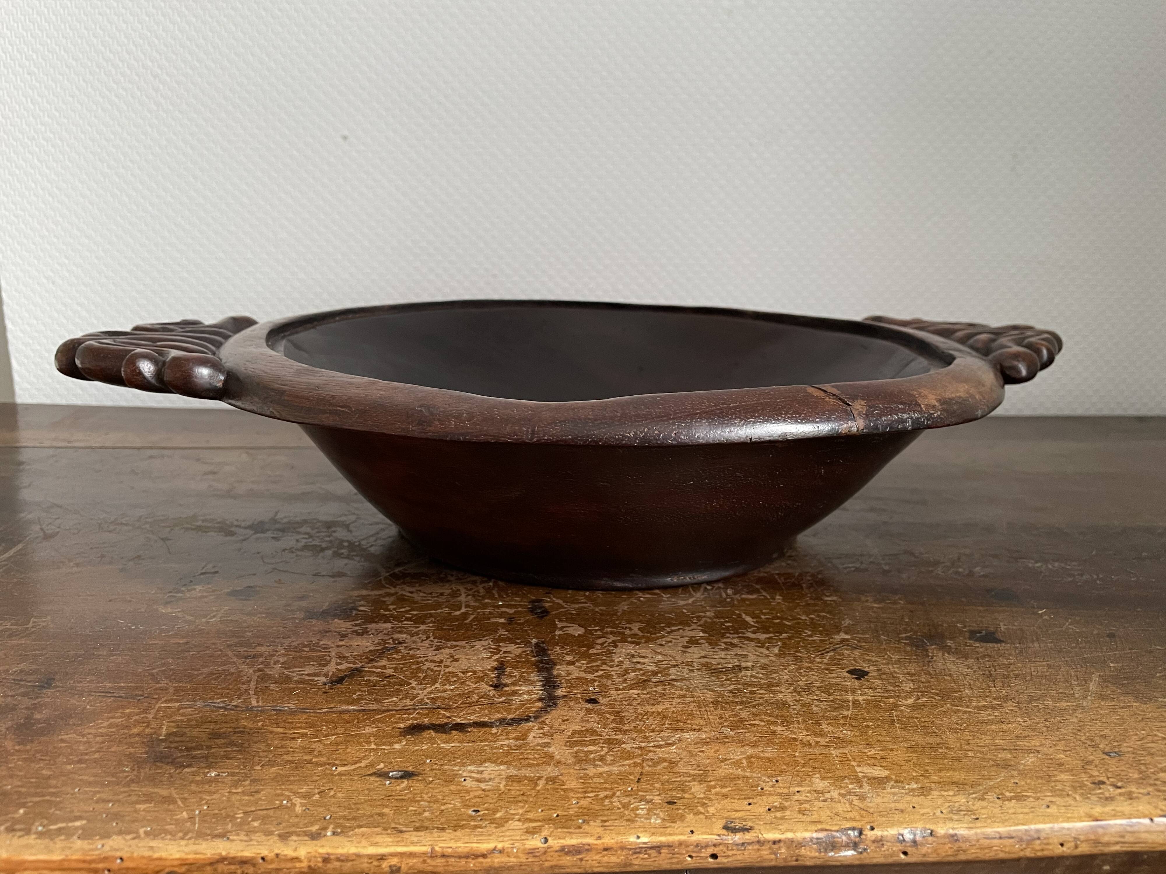 Hollow carved wooden dish