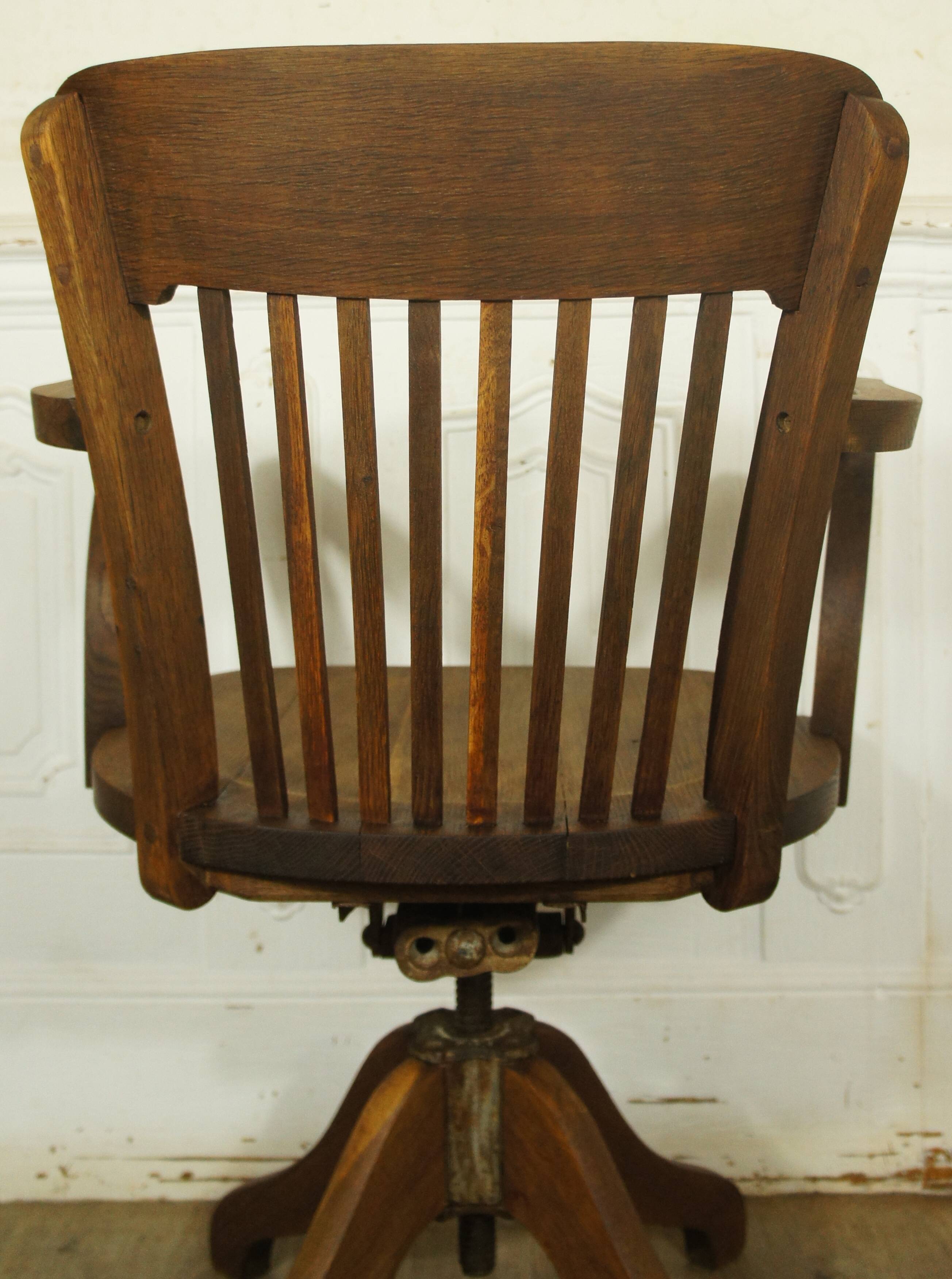 American solid oak armchair, swivel 360 °, tilting & adjustable in height. c. 1920