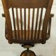 American solid oak armchair, swivel 360 °, tilting & adjustable in height. c. 1920