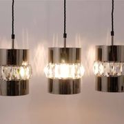 Three Bakalowits pendant lamps in nickel, brass, and faceted crystal, Austria, 1950s.