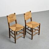 Paire de chaises modèle Bauche par Charlotte Perriand, circa 1950
