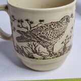 Set of four mugs in enamelled sandstone with bird decoration, made in england