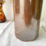 Vintage iridescent brown stoneware bottle