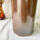 Vintage iridescent brown stoneware bottle