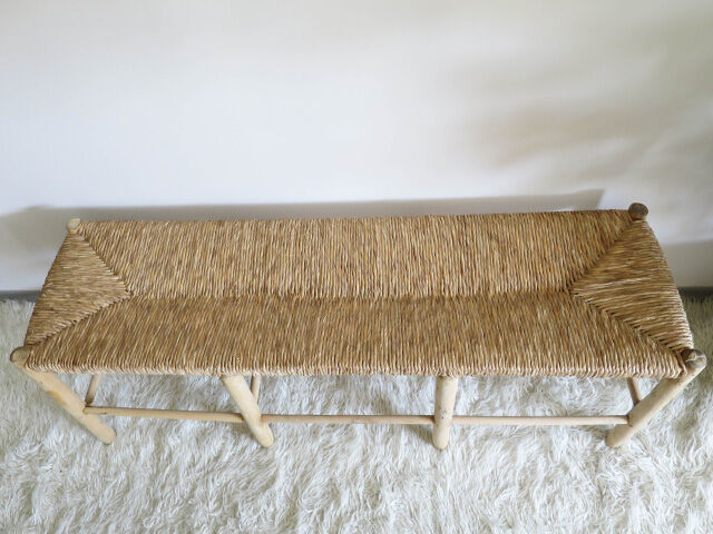 Wooden bench and straw