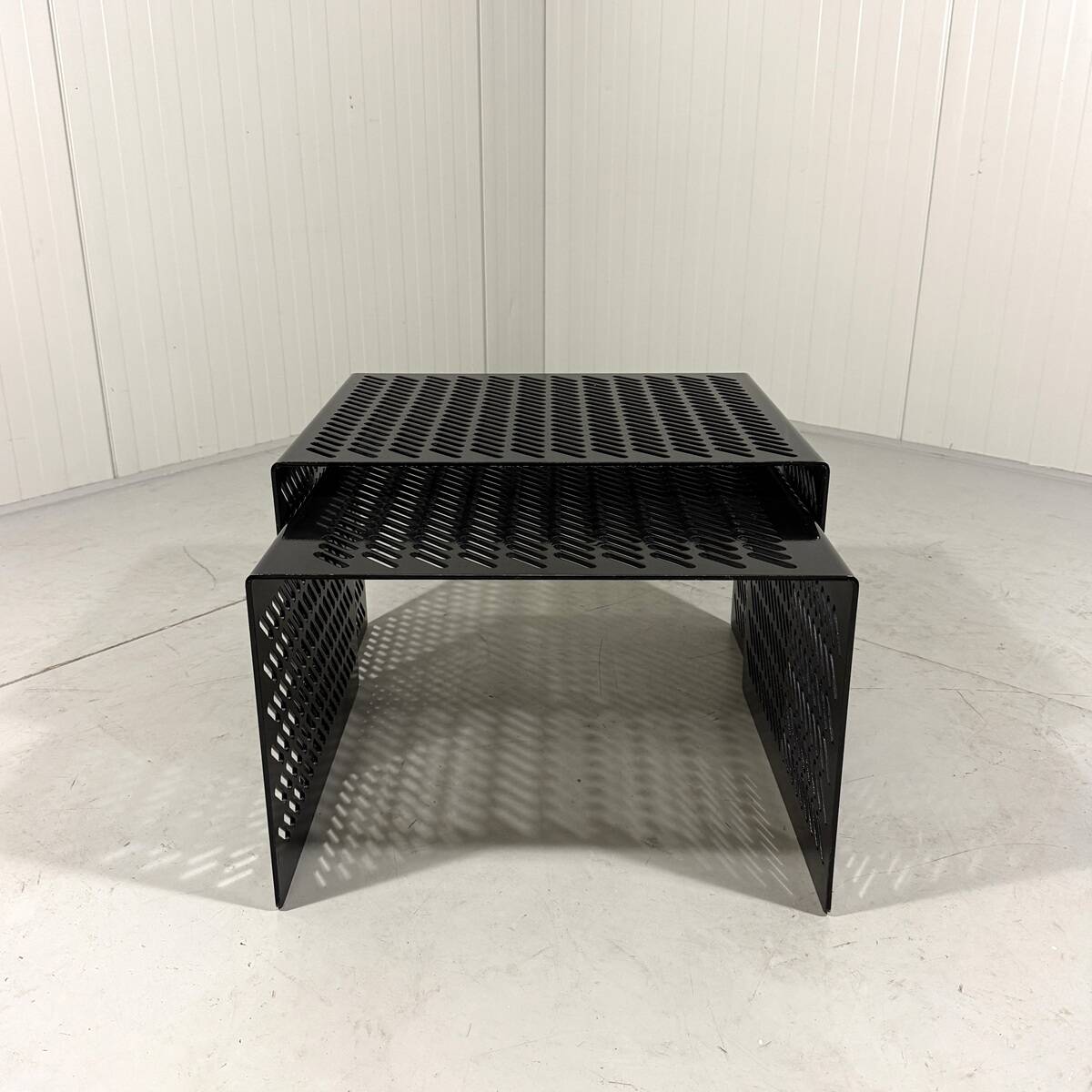 Black perforated steel nesting tables Italy 1980’s
