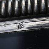 Crystal cup surrounded by two silver friezes