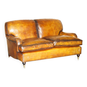 Howard & Son restored leather canapé, width 145 cm