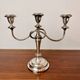 Vintage twisted chandelier with three lights in silver-plated metal.