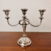 Vintage twisted chandelier with three lights in silver-plated metal.