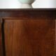 Solid walnut chest of drawers from the early 20th century.