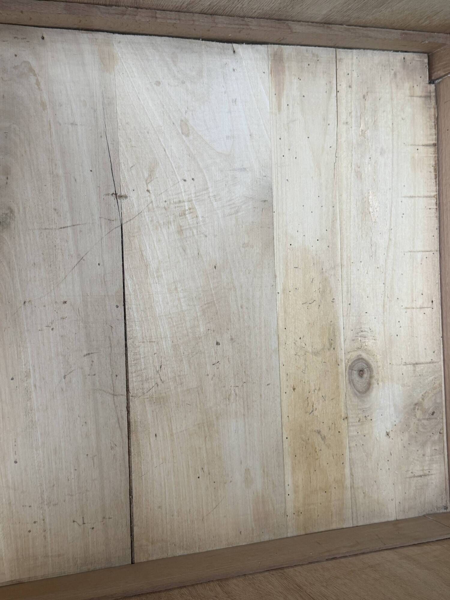 Parisian Art Deco wardrobe, renovated with raw wood.