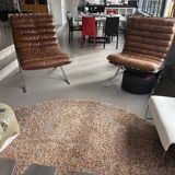 Pair of brown leather armchairs