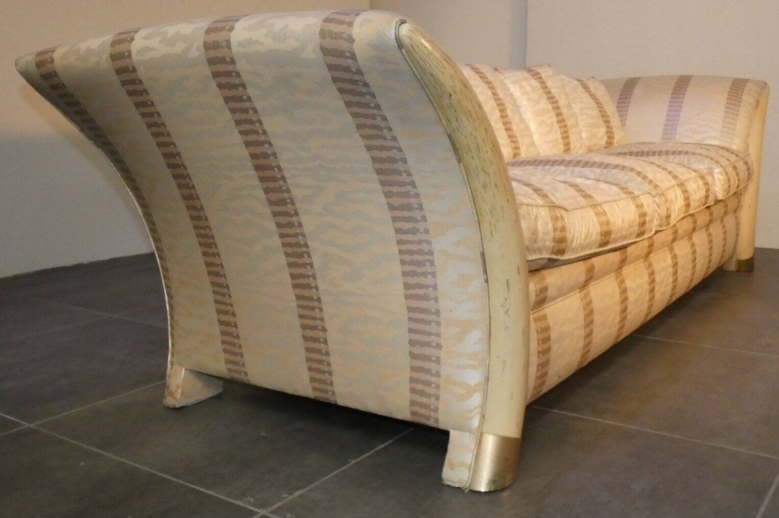 Sofa and armchair in colonial style with saber legs in resin, Italy, 1970s.