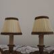 Paire de lampes candélabres vintage en bronze avec abat-jours en tissu plissé, France