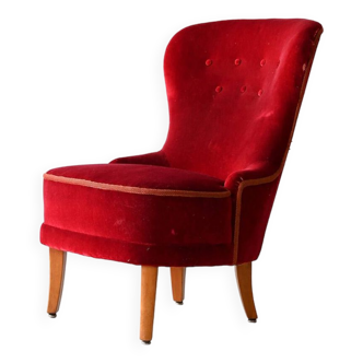 Fauteuil en velours rouge