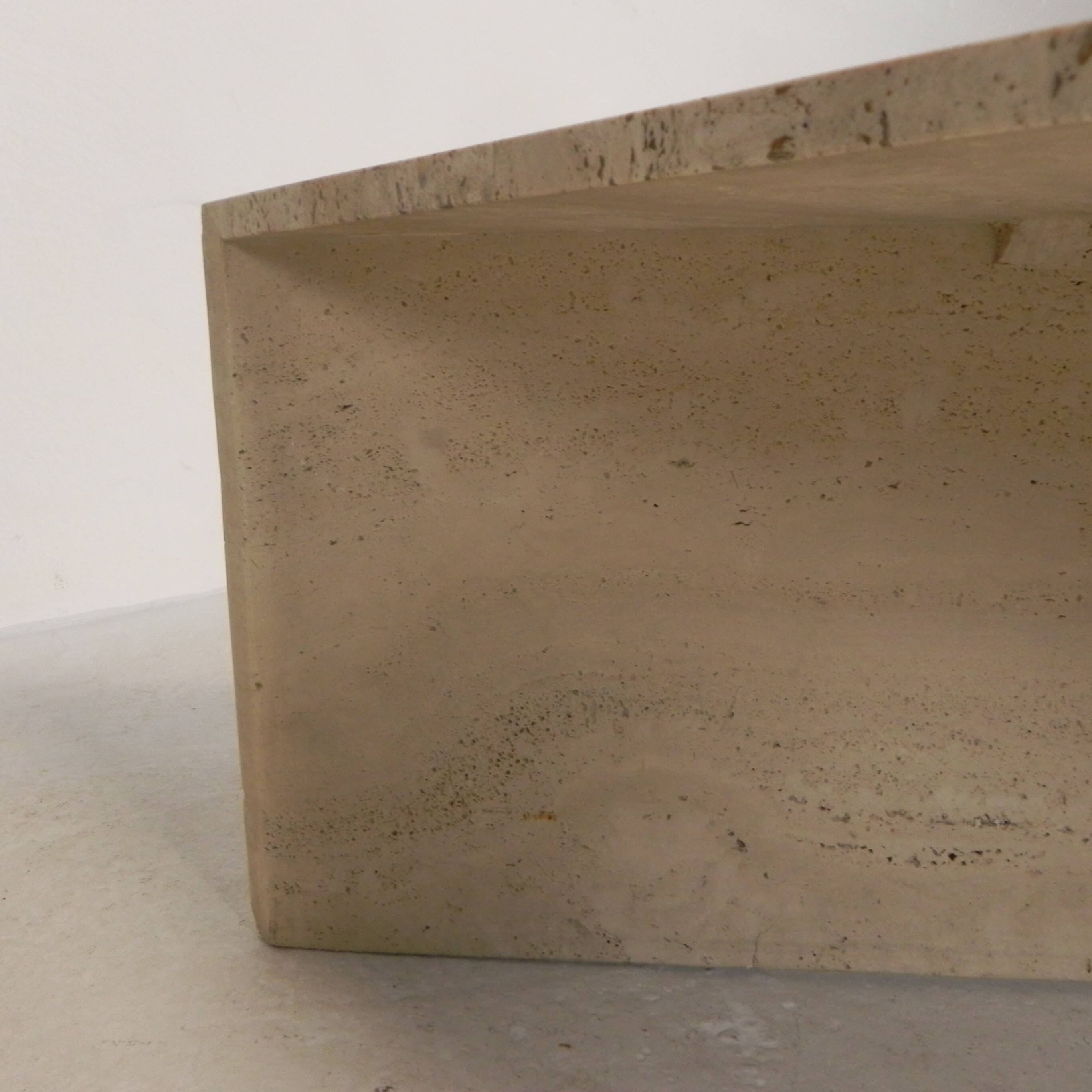 Mid-Century travertine coffee table with a triangular top, 1970s.