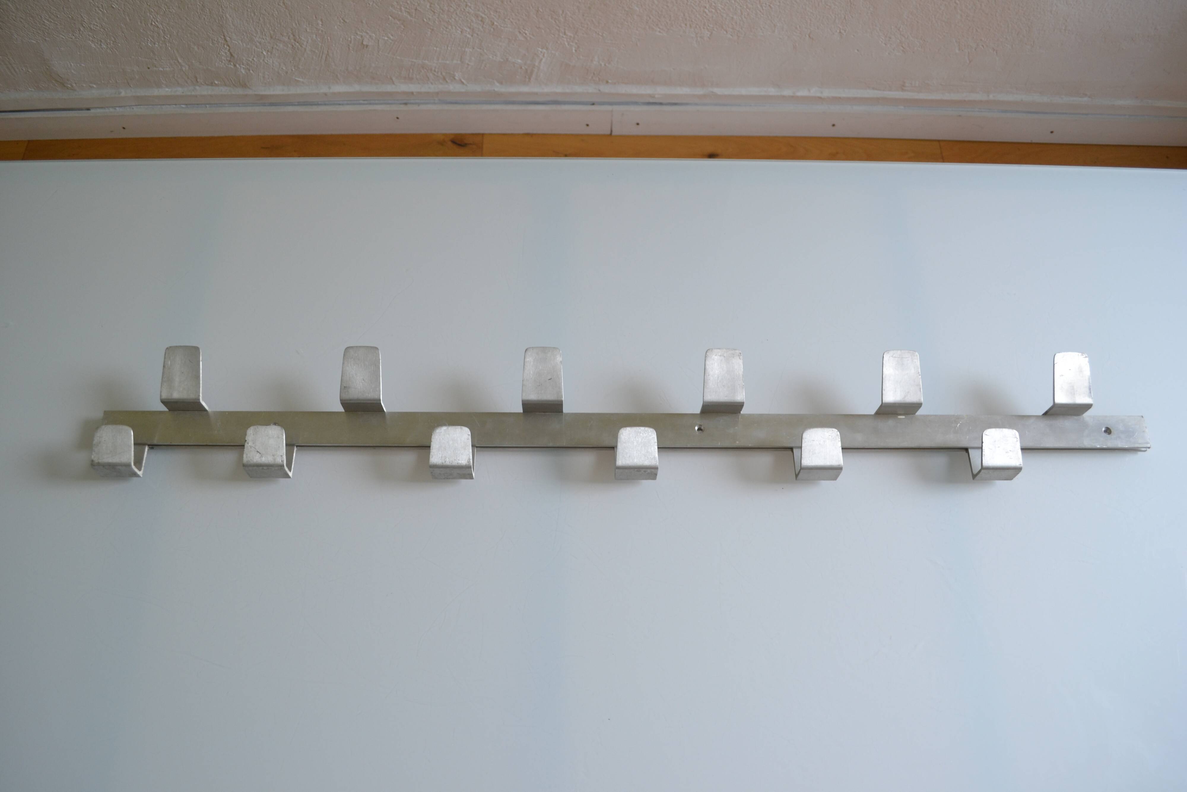 Vintage 70s brushed aluminum metal 12-hook wall coat rack