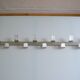 Vintage 70s brushed aluminum metal 12-hook wall coat rack