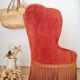 Red velvet toad armchair with fringes