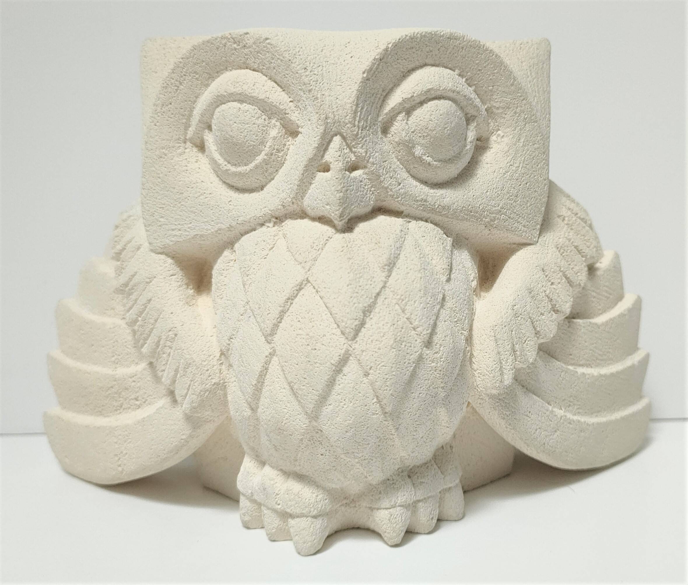 Signed stone owl sculpture