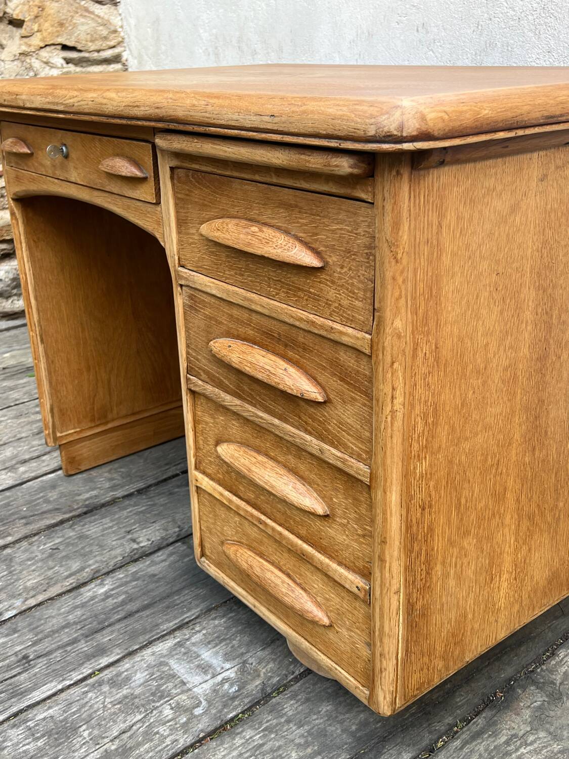 Antique light oak desk from the 1950s with 4 drawers