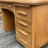 Antique light oak desk from the 1950s with 4 drawers
